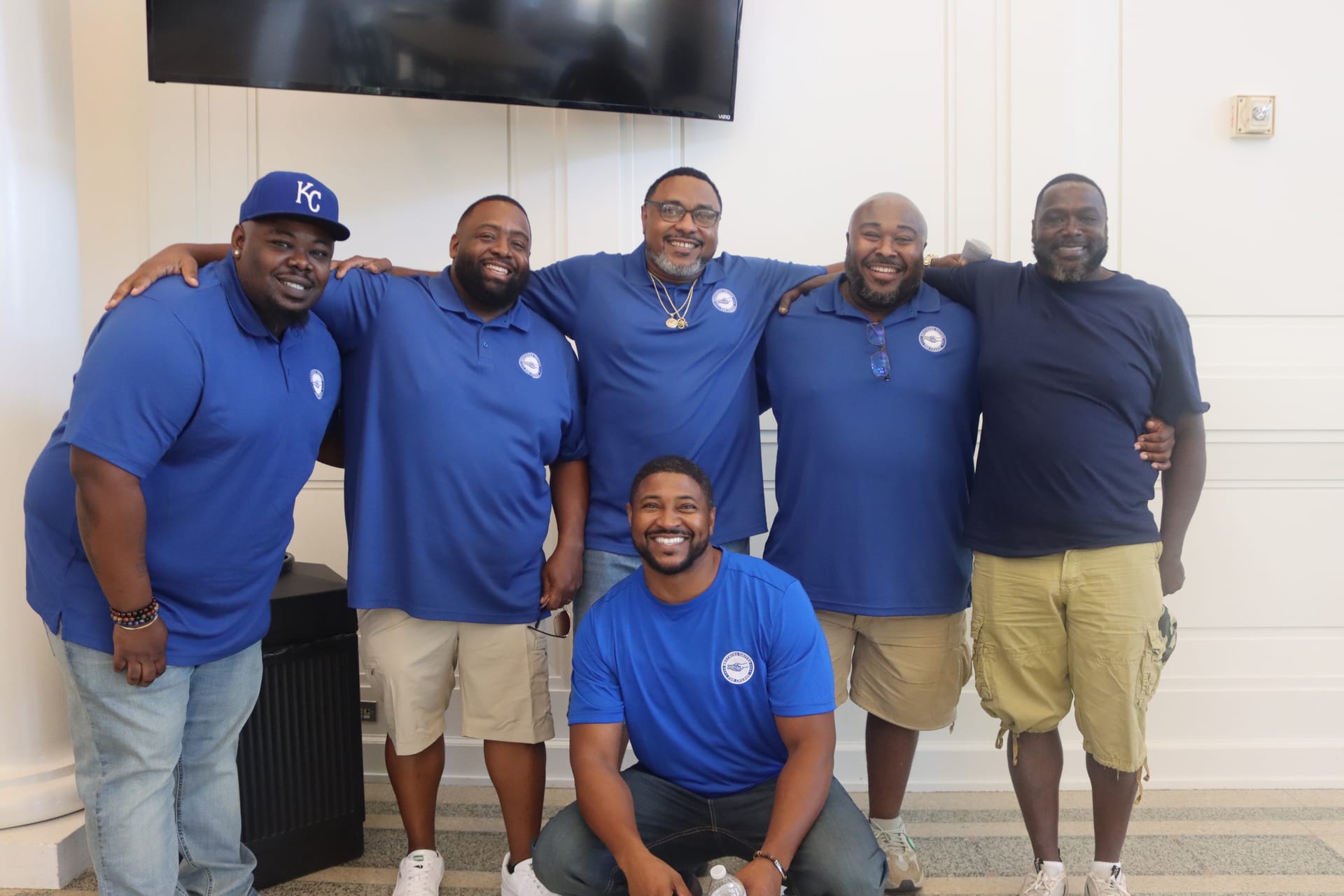 BUFC brothers in blue shirts at conference