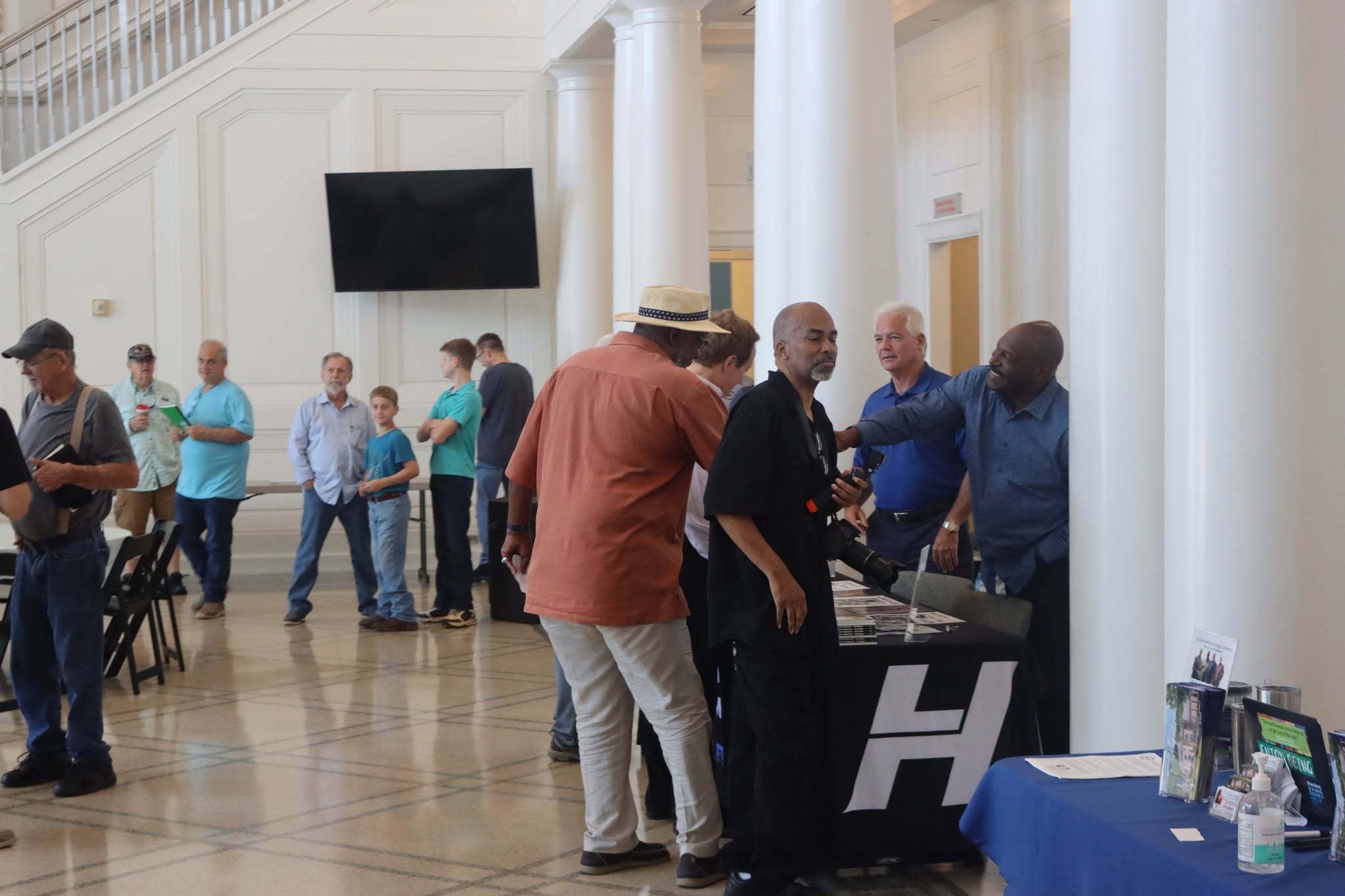 BUFC brothers networking and giving back at conference