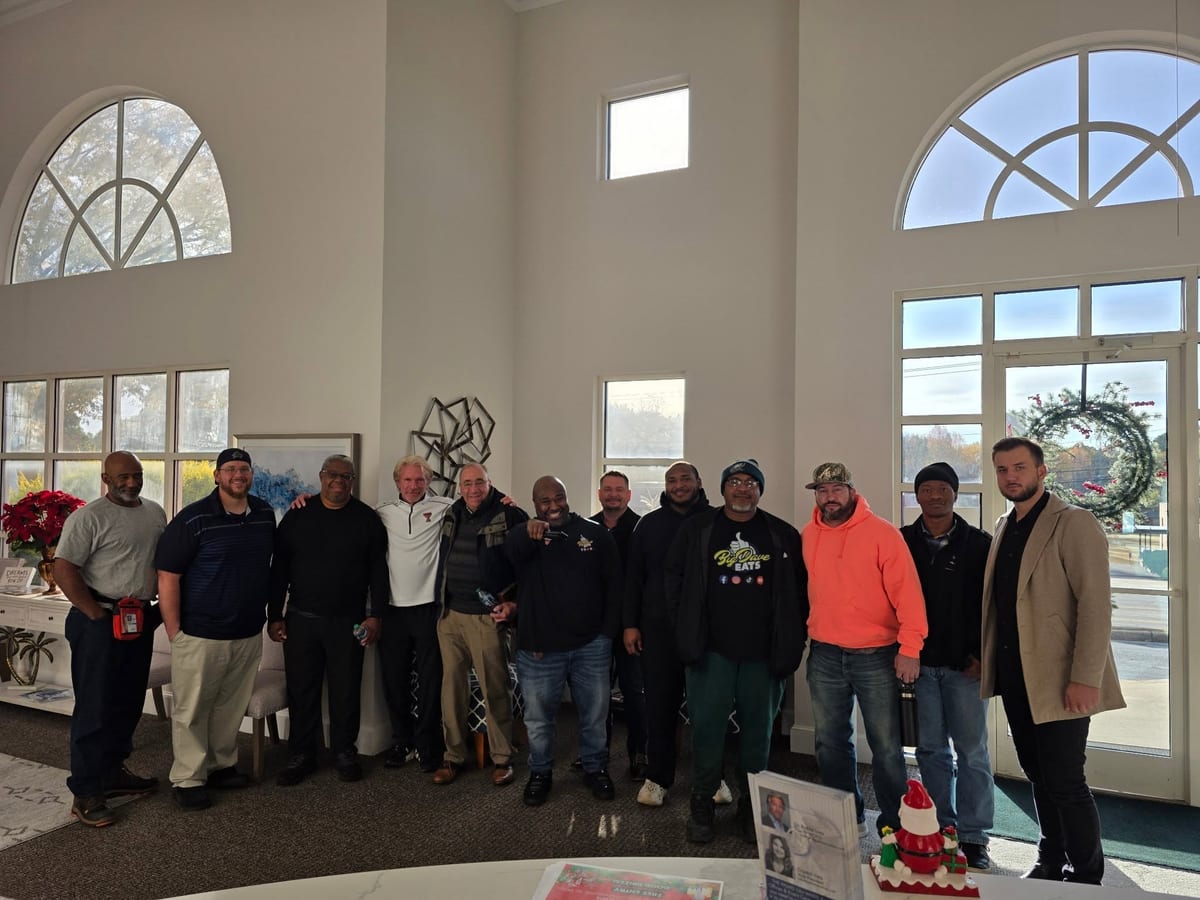 Brothers United For Change members gathered at The Palms on White