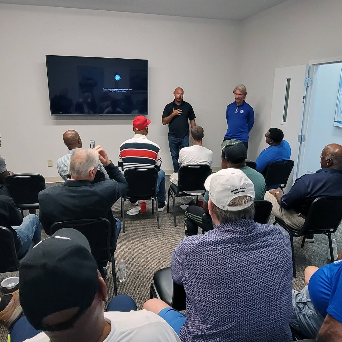Guest speaker presenting at BUFC bi-weekly meeting