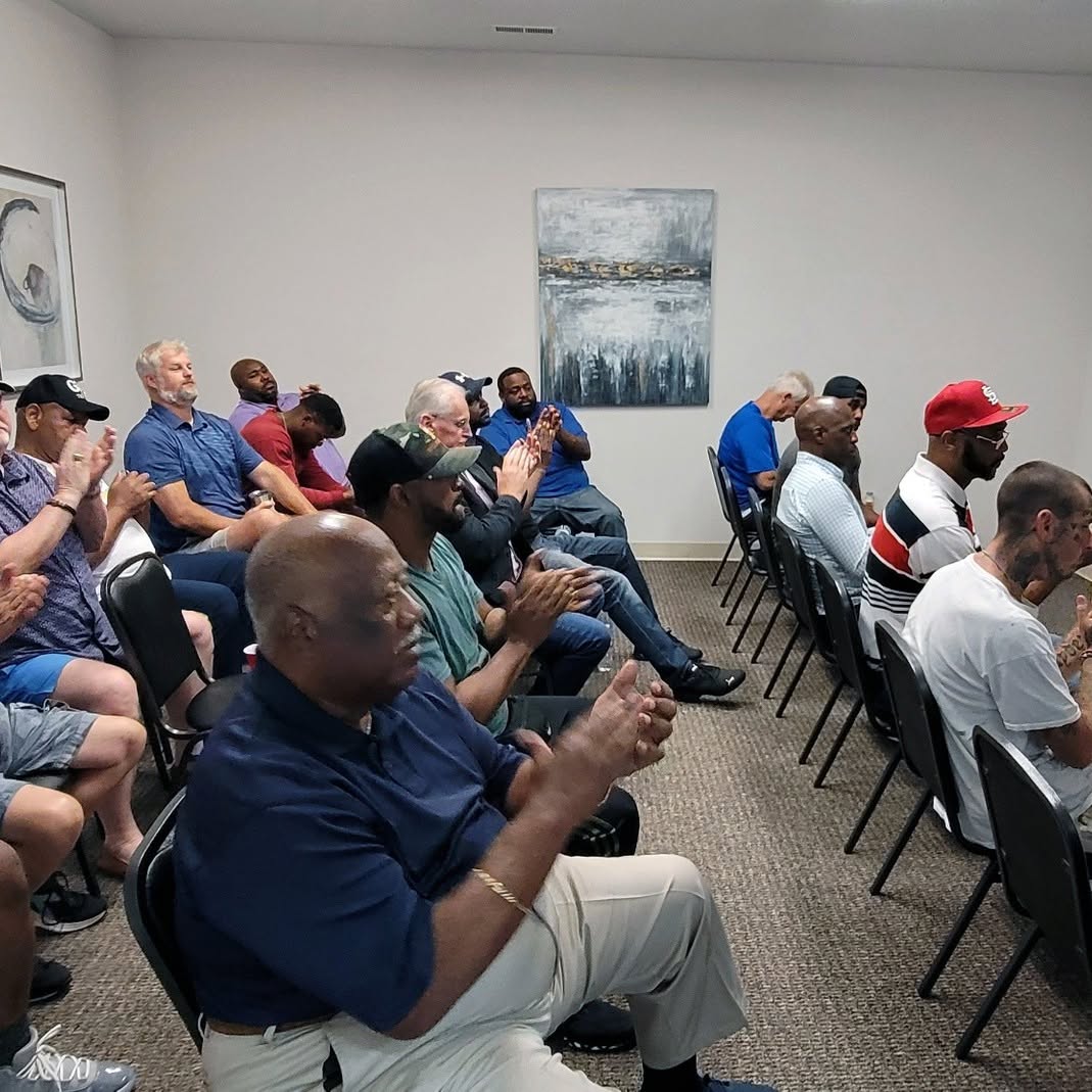 BUFC brothers gathered together at a member meeting