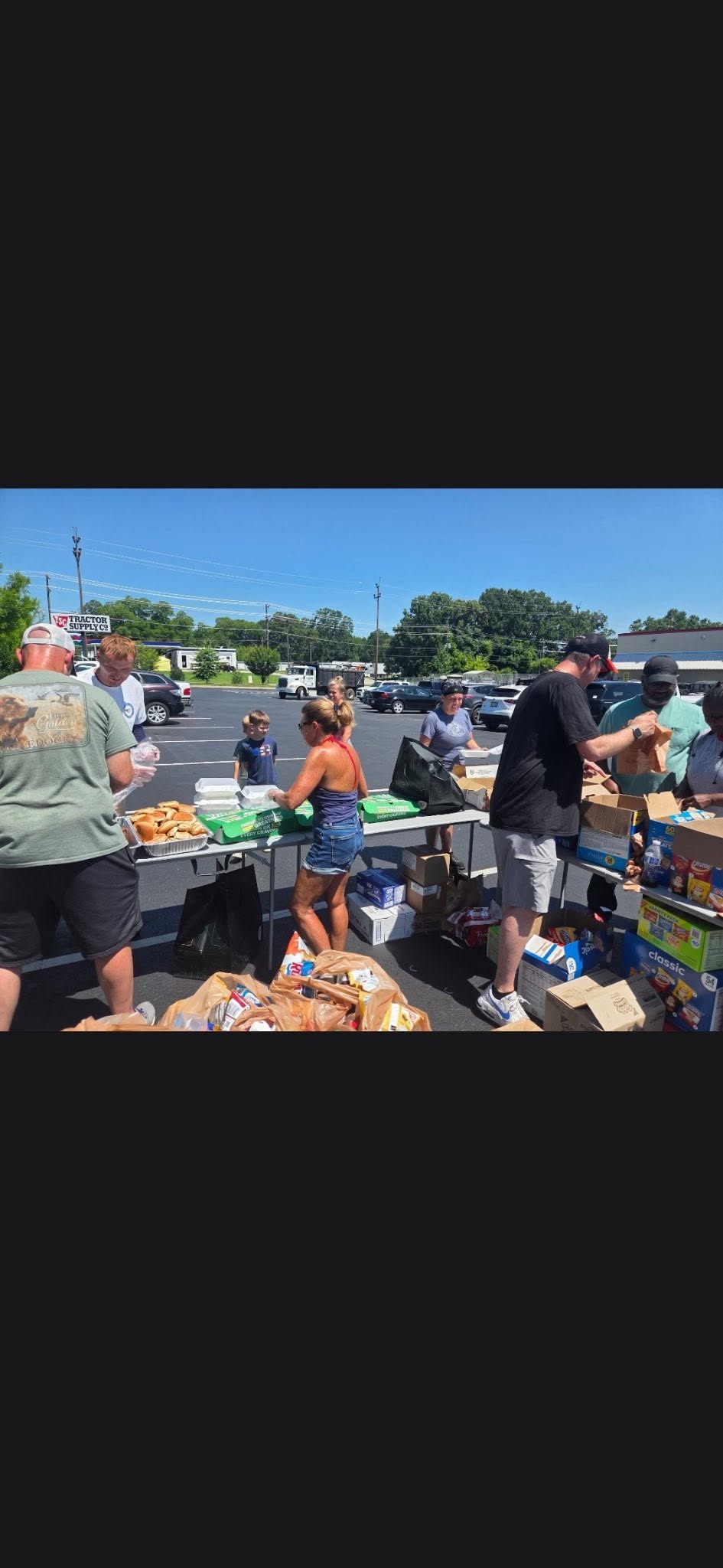 BUFC cookout in Woodruff parking lot serving the community